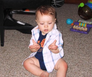 This is Carter using the baby sign for book!